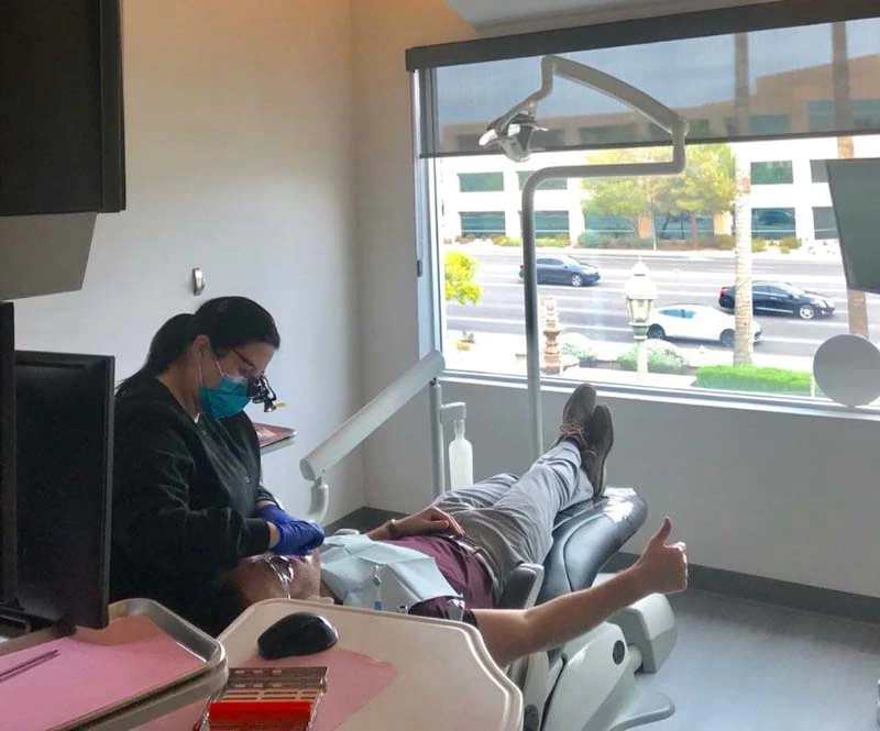 patient receiving dental care at Serenity Smiles