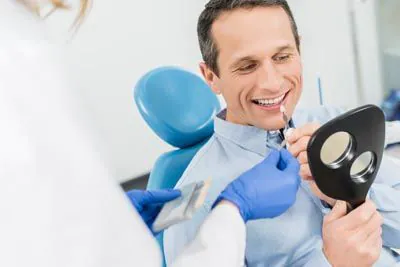 man choosing dental veneers at Serenity Smiles