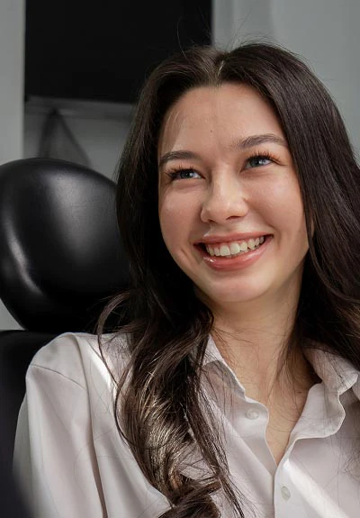 woman smiling at Serenity Smiles