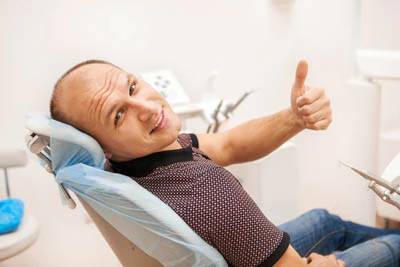man smiling at his visit to Serenity Smiles